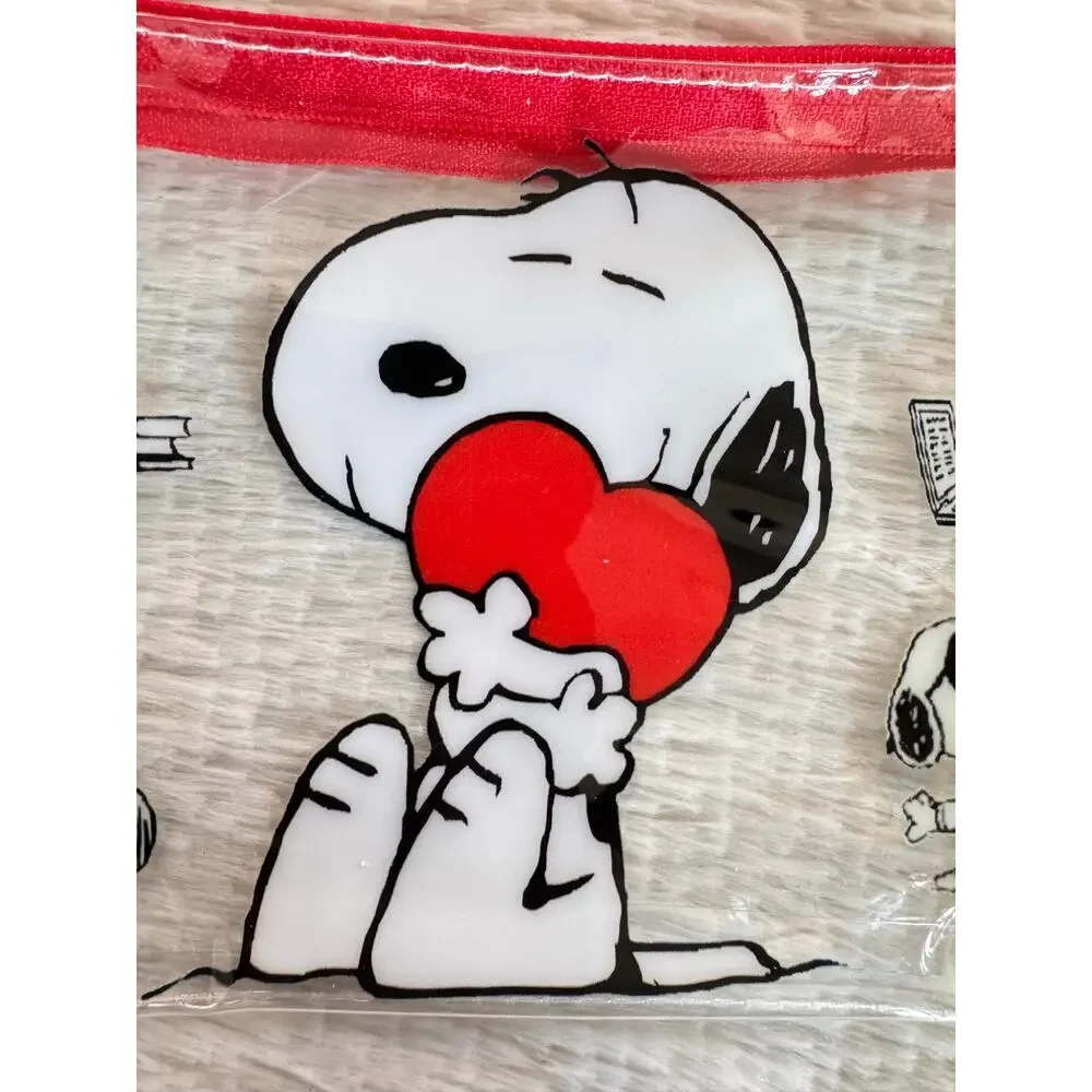 Snoopy clear pouch with Snoopy holding a red heart keychain zipper